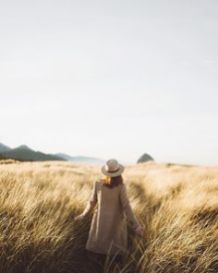 Girl's walking through the field